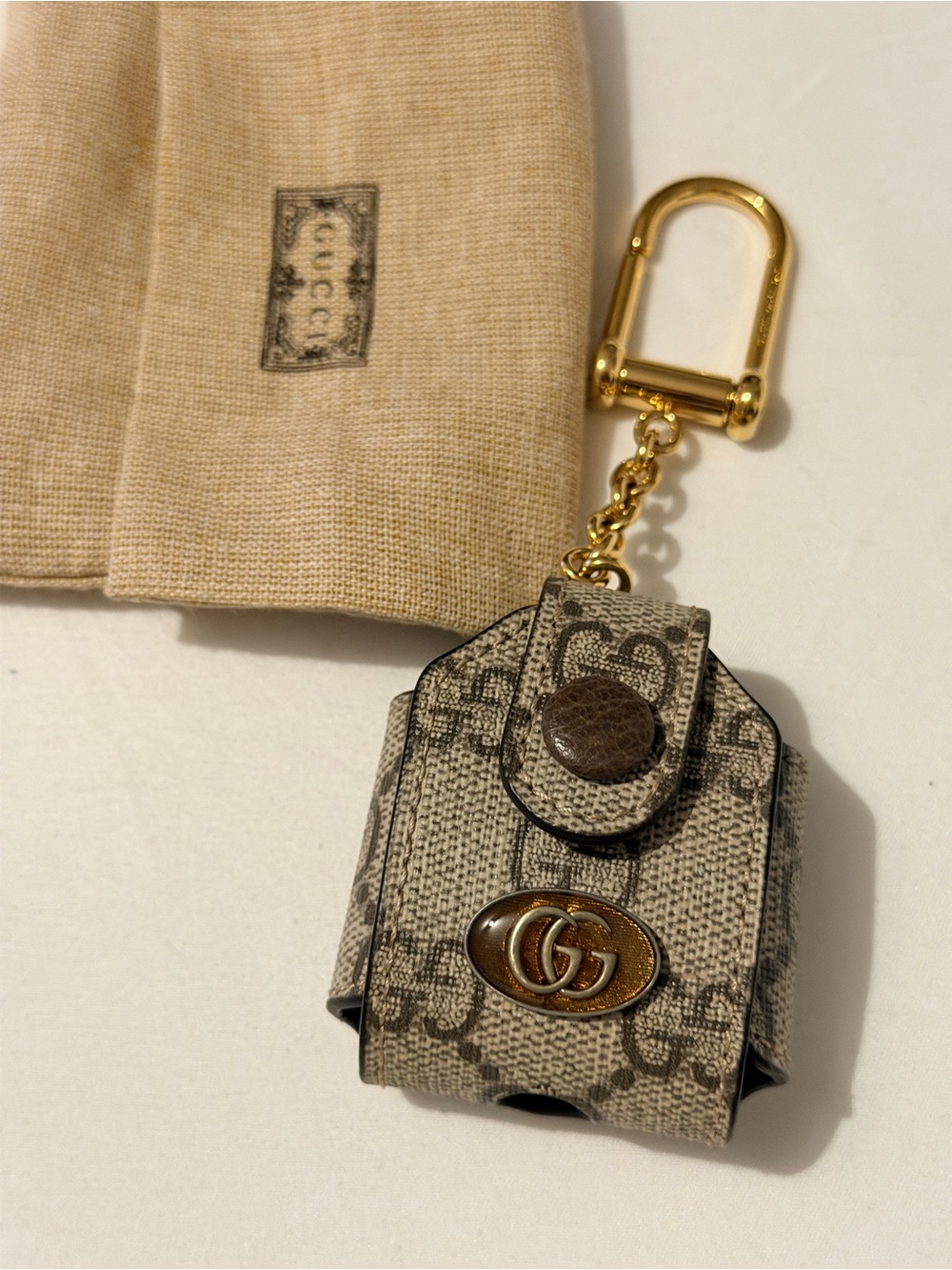 Gucci Beige Monogram Canvas AirPods Case Keychain with Gold Hardware